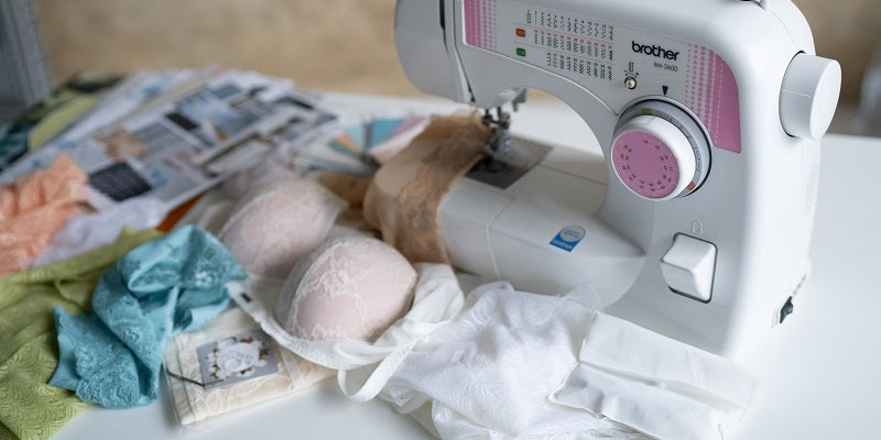 Laces and Bras lying on a sewing machine