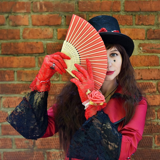 Person in costume wth red lace gloves.jpg