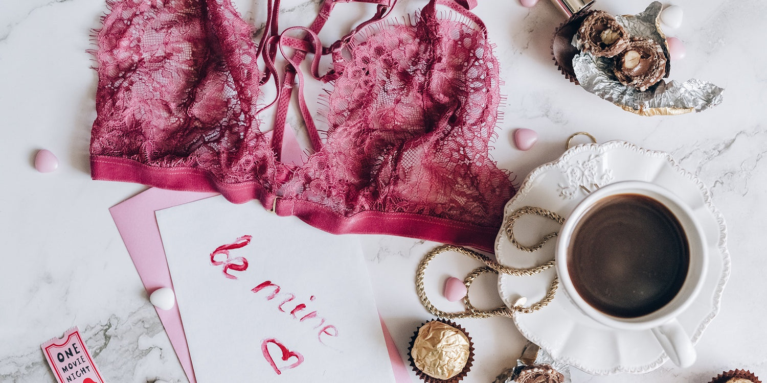 Red lacy bralette a cup of coffee and sweets